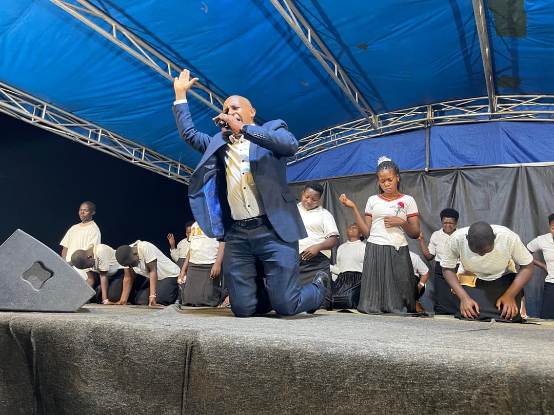 Bishop praying for a congregation